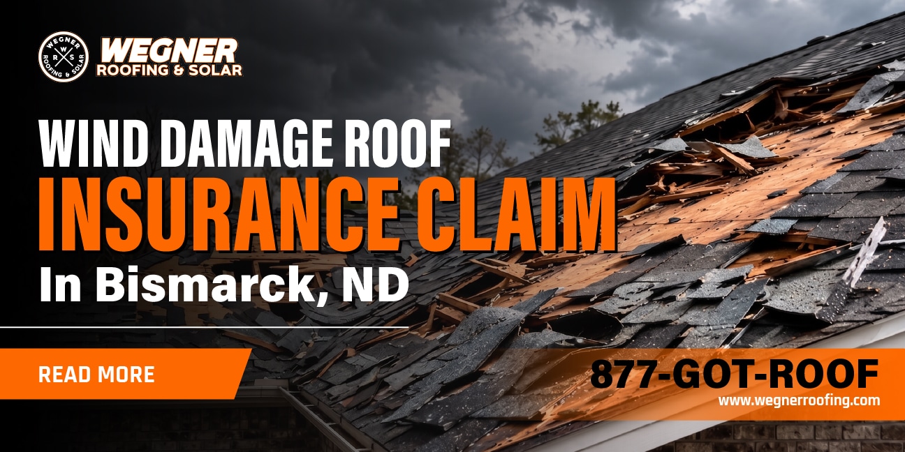 Storm-damaged asphalt roof with Wegner Roofing branding and wind damage insurance claim in Bismarck, North Dakota